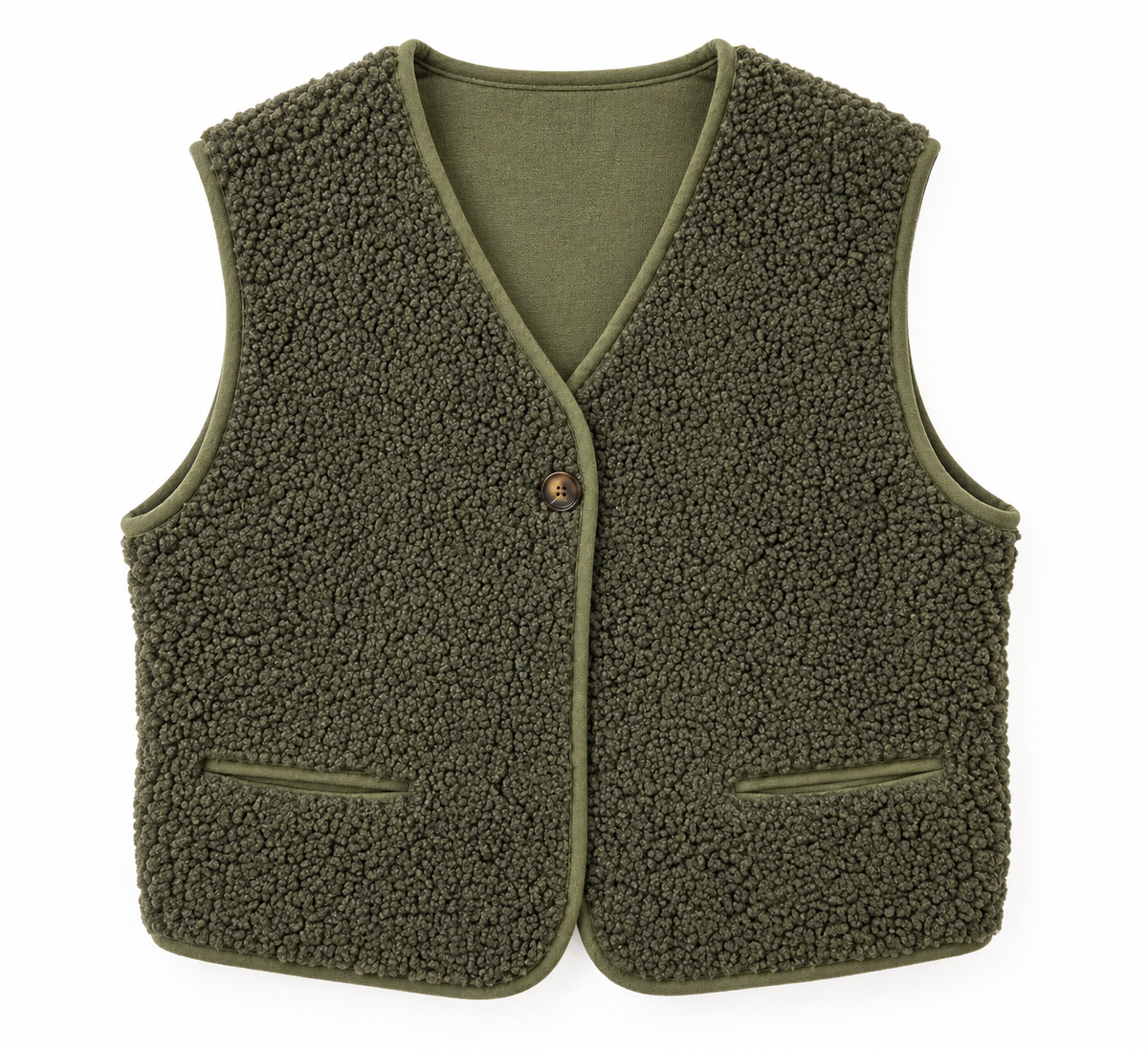 Gilet sans manches réversible femme teddy kaki porté ouvert sur col roulé blanc et jean, look casual chic automne hiver fond studio